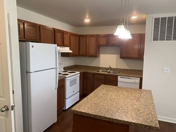 Glenwood beech - bristol cinnamon cabinets